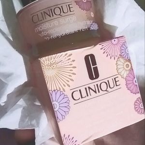2 Piece Bundle: Clinique Jumbo Size Moisture Surge 200ml (6.7oz) + 30ml (1oz)